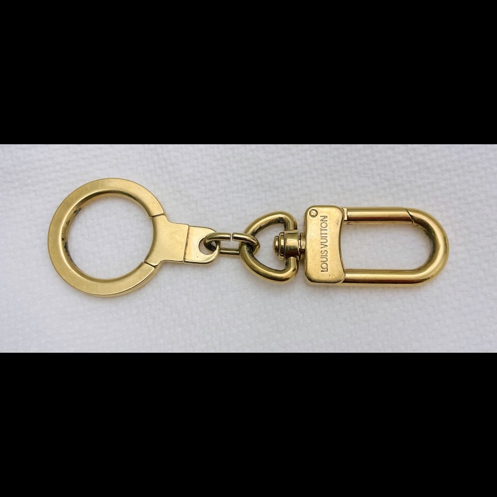 Authentic Louis Vuitton pochette extender/key